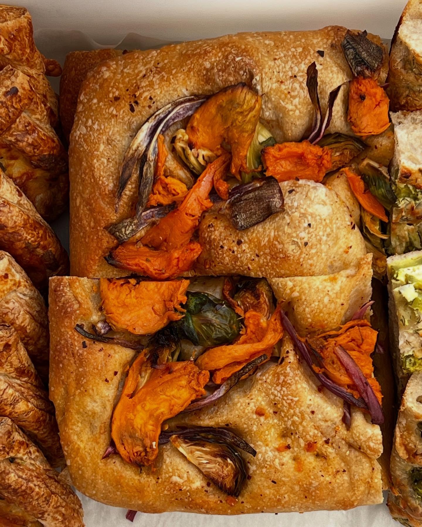 Okey dokey friends. I&rsquo;ve been asked to make more &ldquo;normal&rdquo; pastries (so people will like us better?). 
Here is one of our very normal focaccia slices: house made chili oil all over the dough and tossed through Brussels sprouts. We a